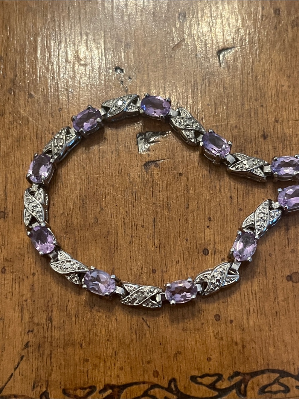 Purple tennis bracelet set in sterling silver